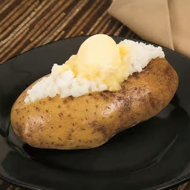 Baked Potato with Buttery Spread & Daisy Sour Cream.